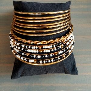 Gold, black and white bangle set